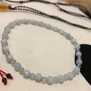 Jades, crystal and a bracelet